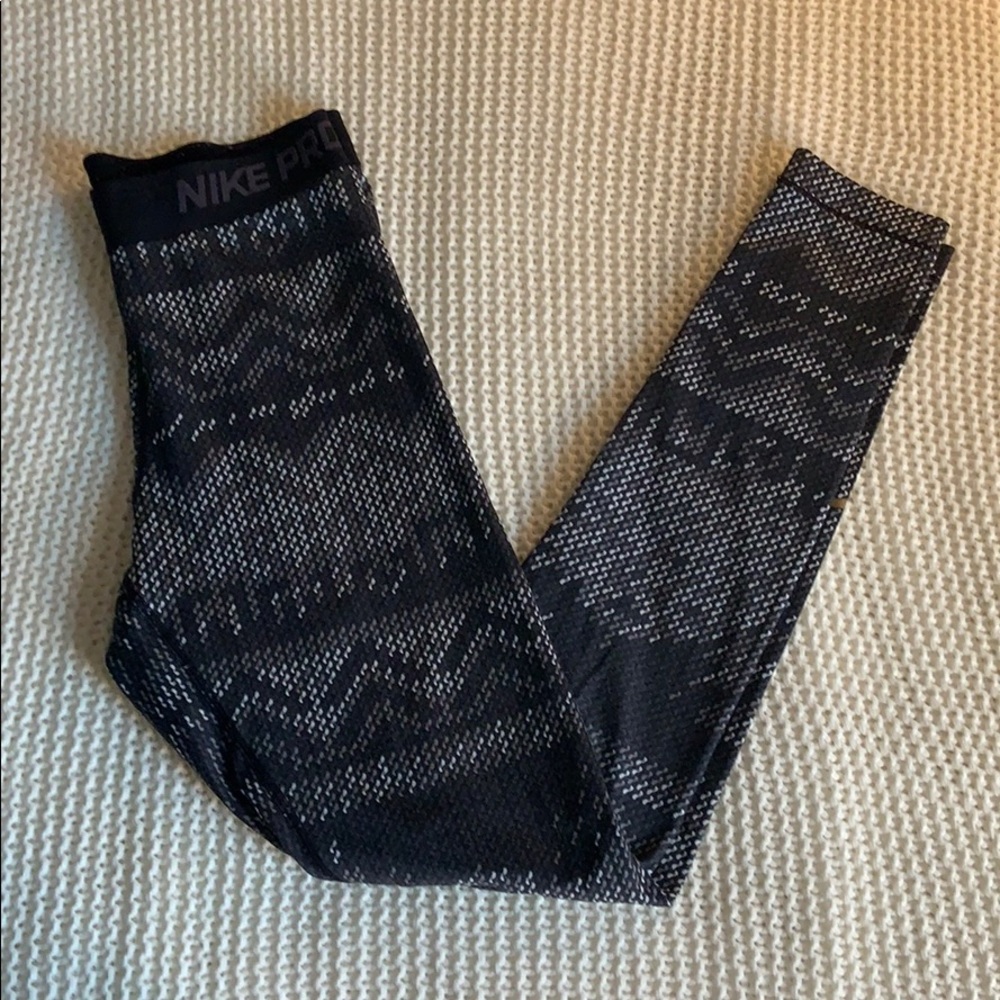 Nike Pro Dri-Fit leggings with gold logo